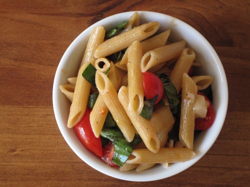 Penne, tomatoes, basil and cheese